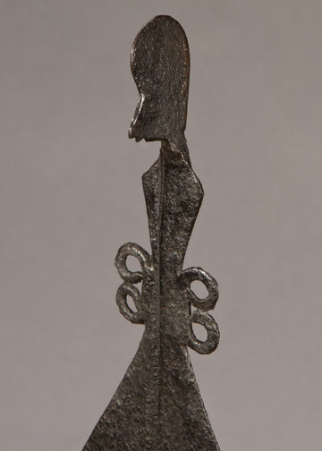 Staff Finial With A Human Form In Profile